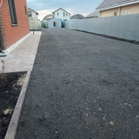 Укладка асфальтной срезки на придомовой территории - Благострой - укладка брусчатки. Бетонные топпинговые полы. Асфальтирование.