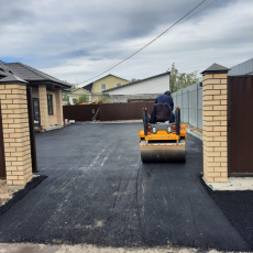 Работы по укладке асфальта